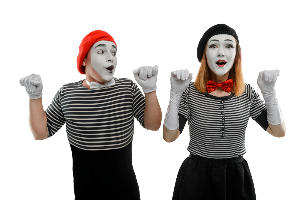 Photo of a man and woman mime